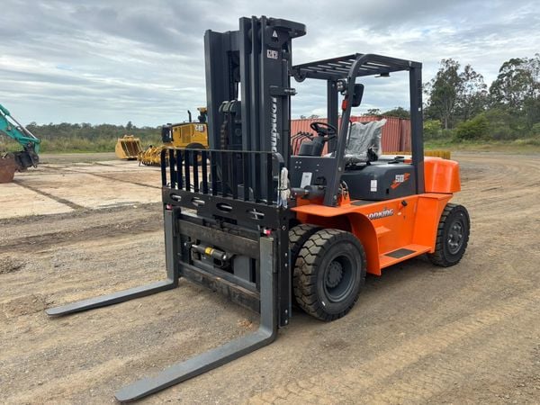one small orange forklift