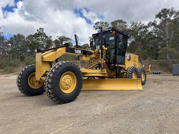 a yellow grader