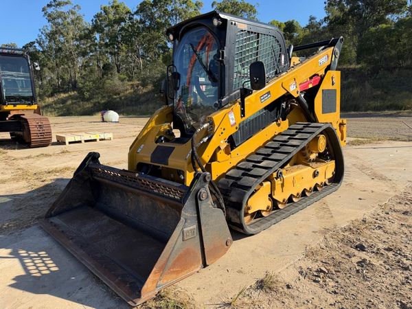 a yellow skid steer